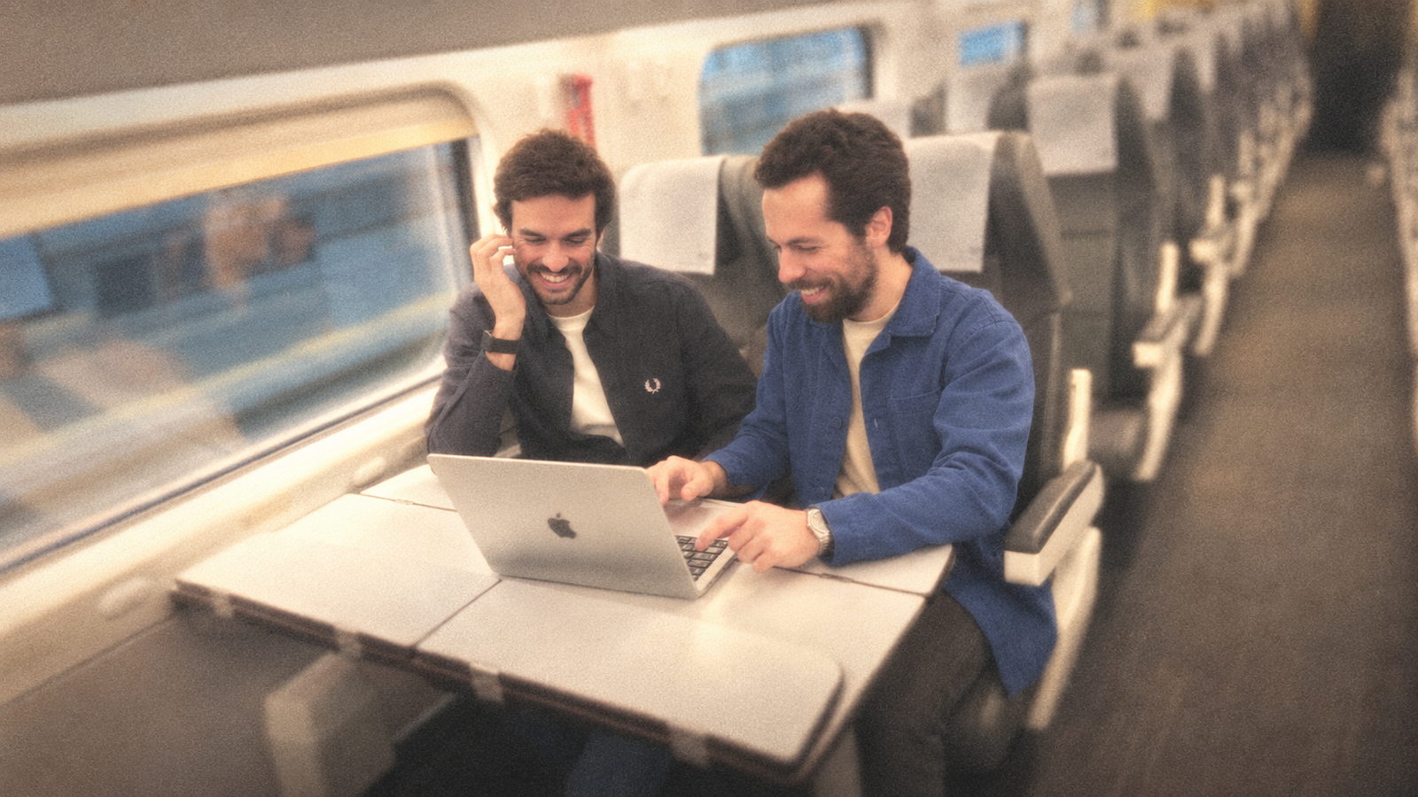 noticed co-founders Filipe and Simão working together on a train.